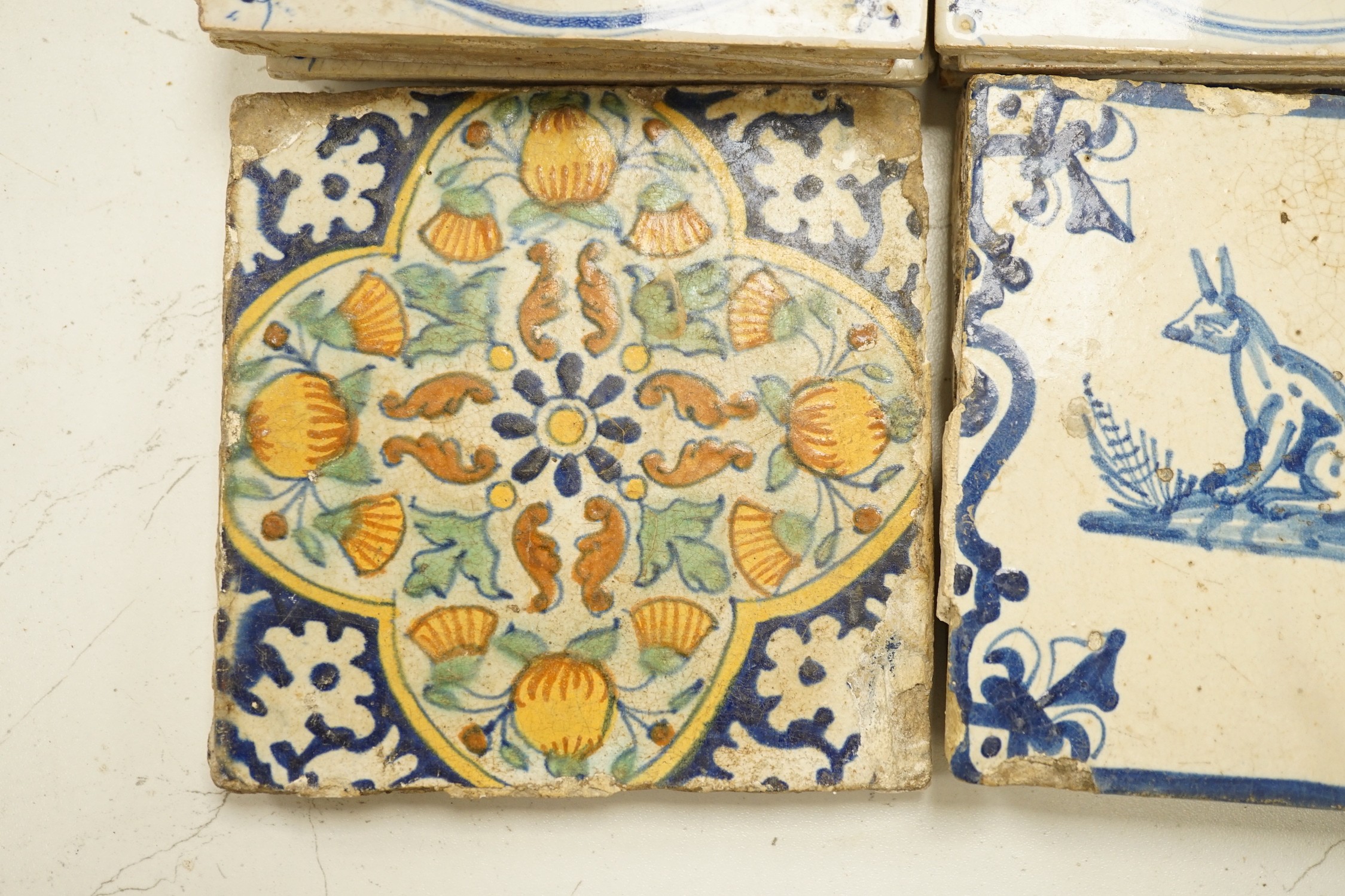 Four 18th century Delft tiles and nine 19th-century Delft blue and white animal tiles(13)